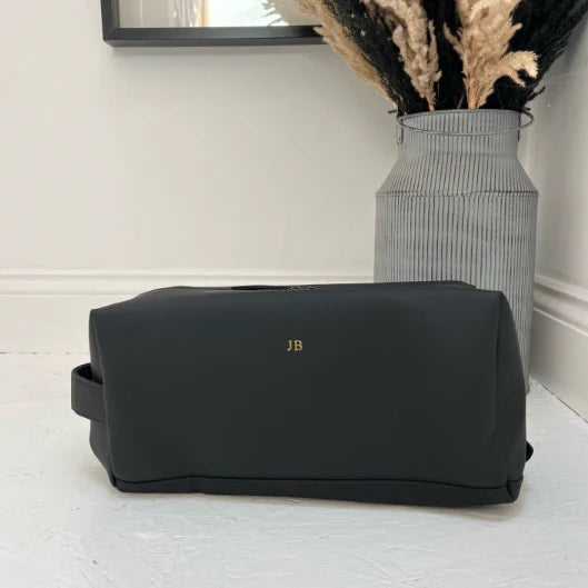 Black shoe bag personalised with JB