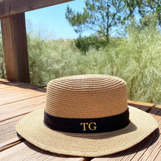 Personalised Beach Hat on wooden floor outdoors