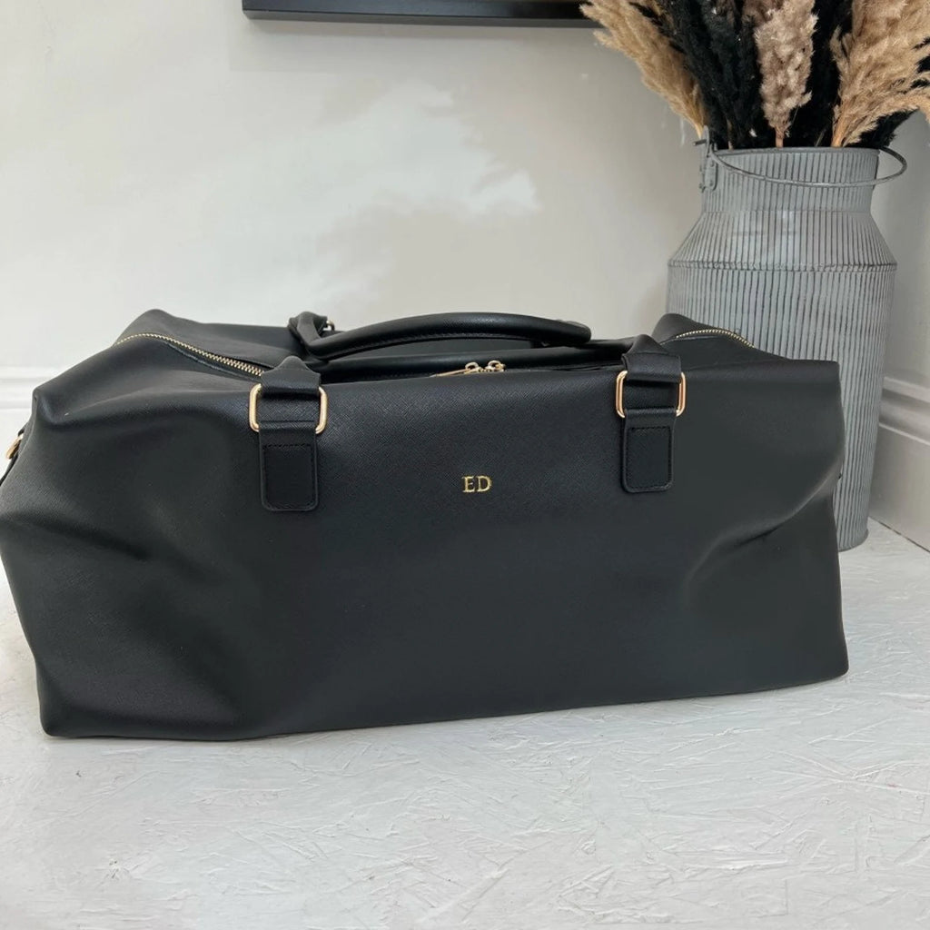 Personalised black weekend bag with gold hardwear