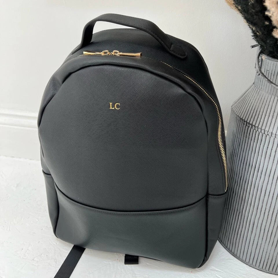 Black backpack with gold initials LC