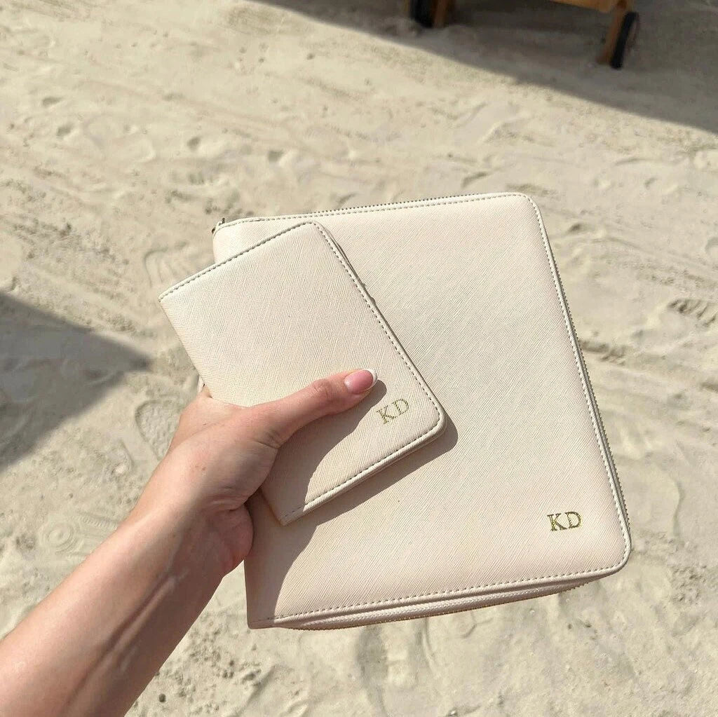 Personalised travel wallet document for passports in beige. image shows the product with a matching passport cover