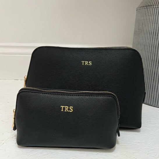 Two black cosmetic bags with personalised initials