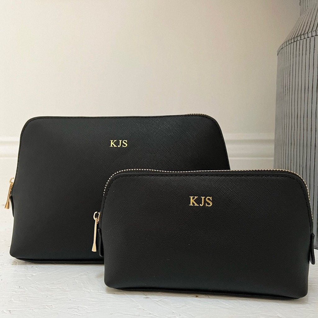 Personalised Mini Make Up Bag. Image shows two black matching make up bags.