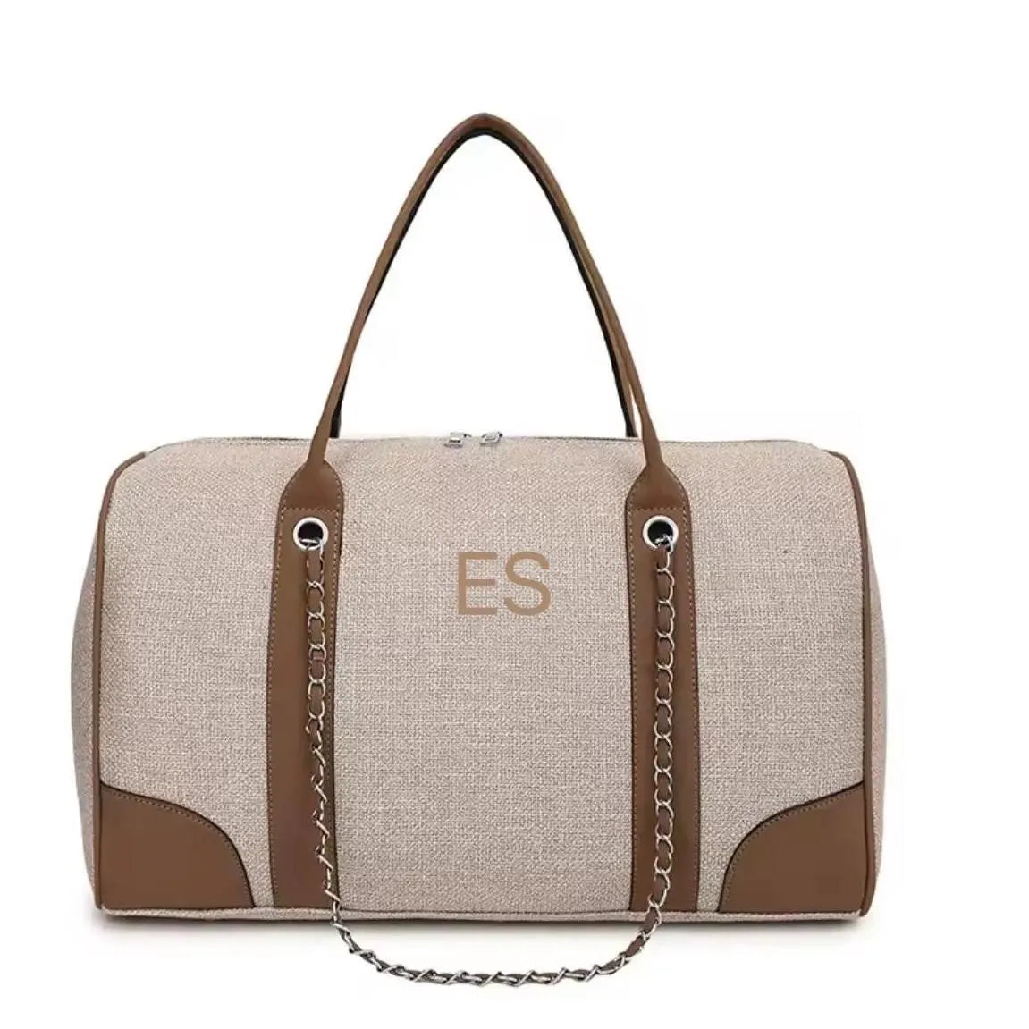 Beige duffel bag with brown accents and 'ES' initials on a white background