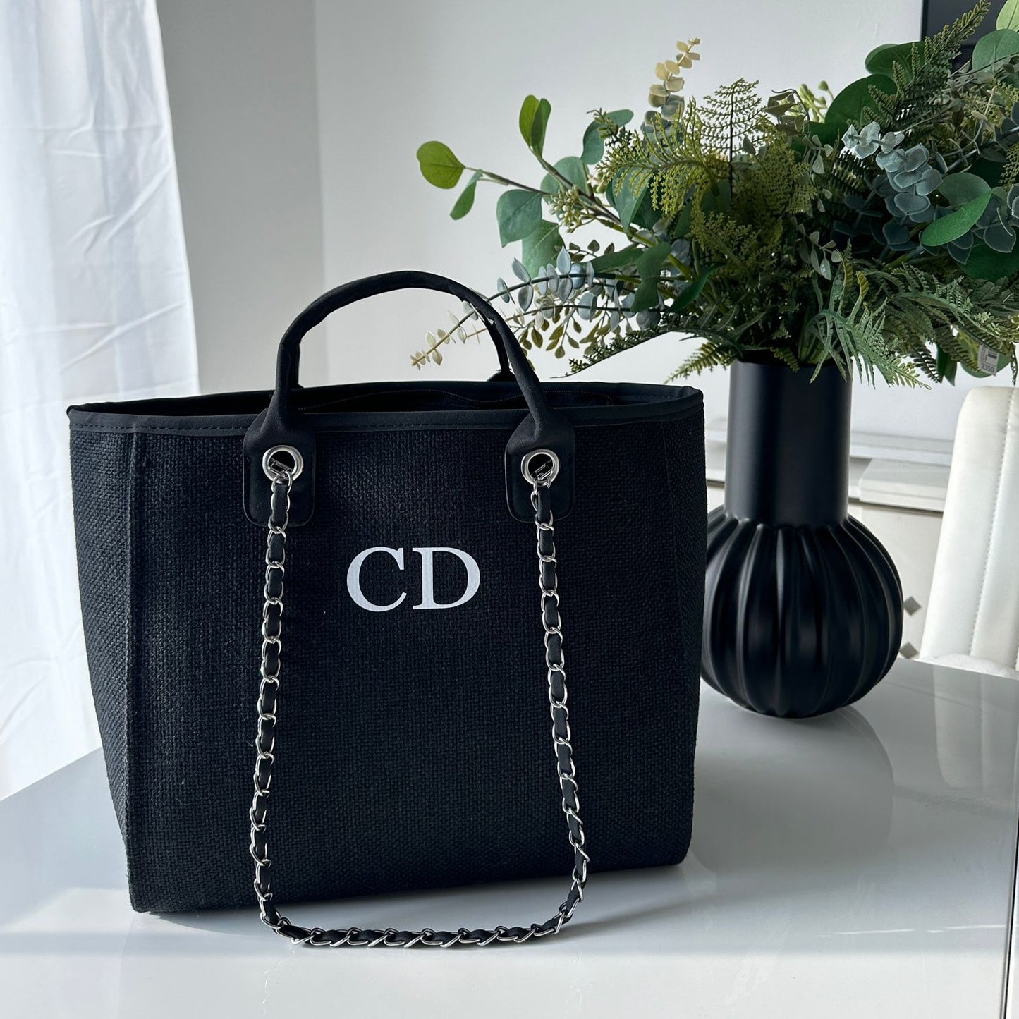 personalised black tote bag on table