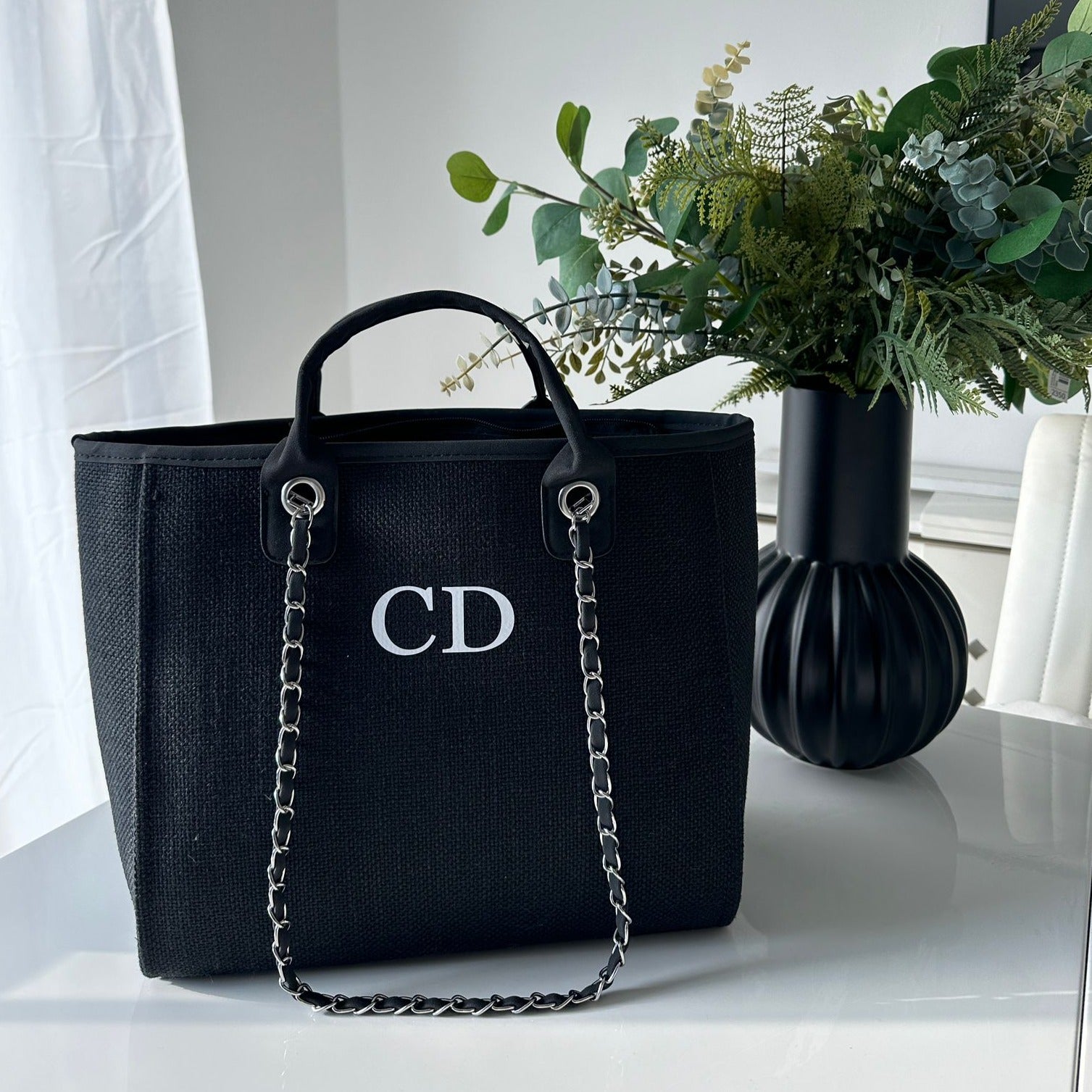 personalised black tote bag on table