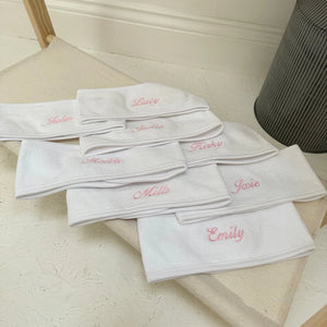 stack of spa headband with personalisation