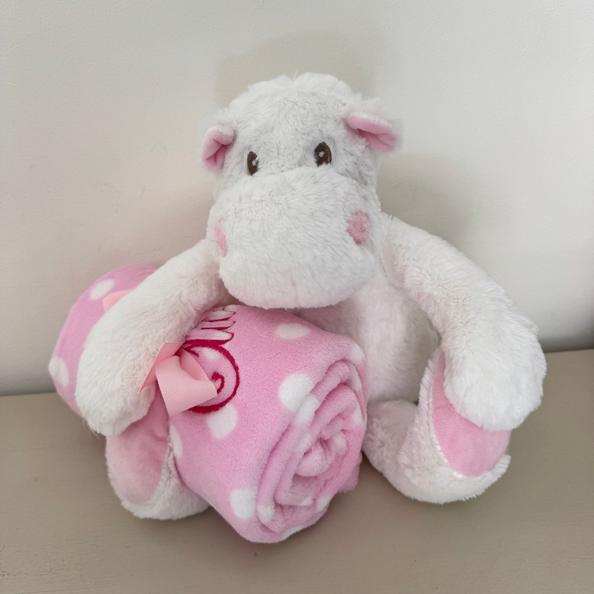 Personalised Baby Blanket and Toy Set in Pink, with blanket being held by toy