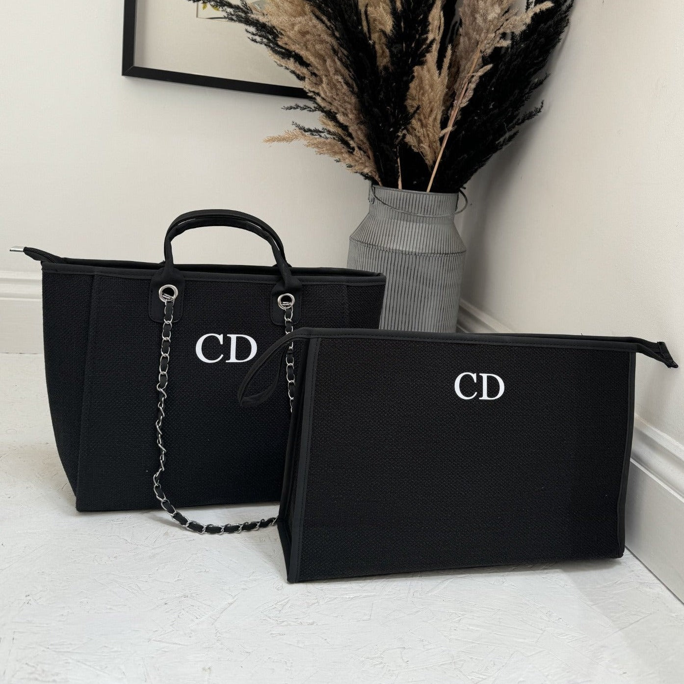 personalised tote bag and matching clutch bag with initials CD on them