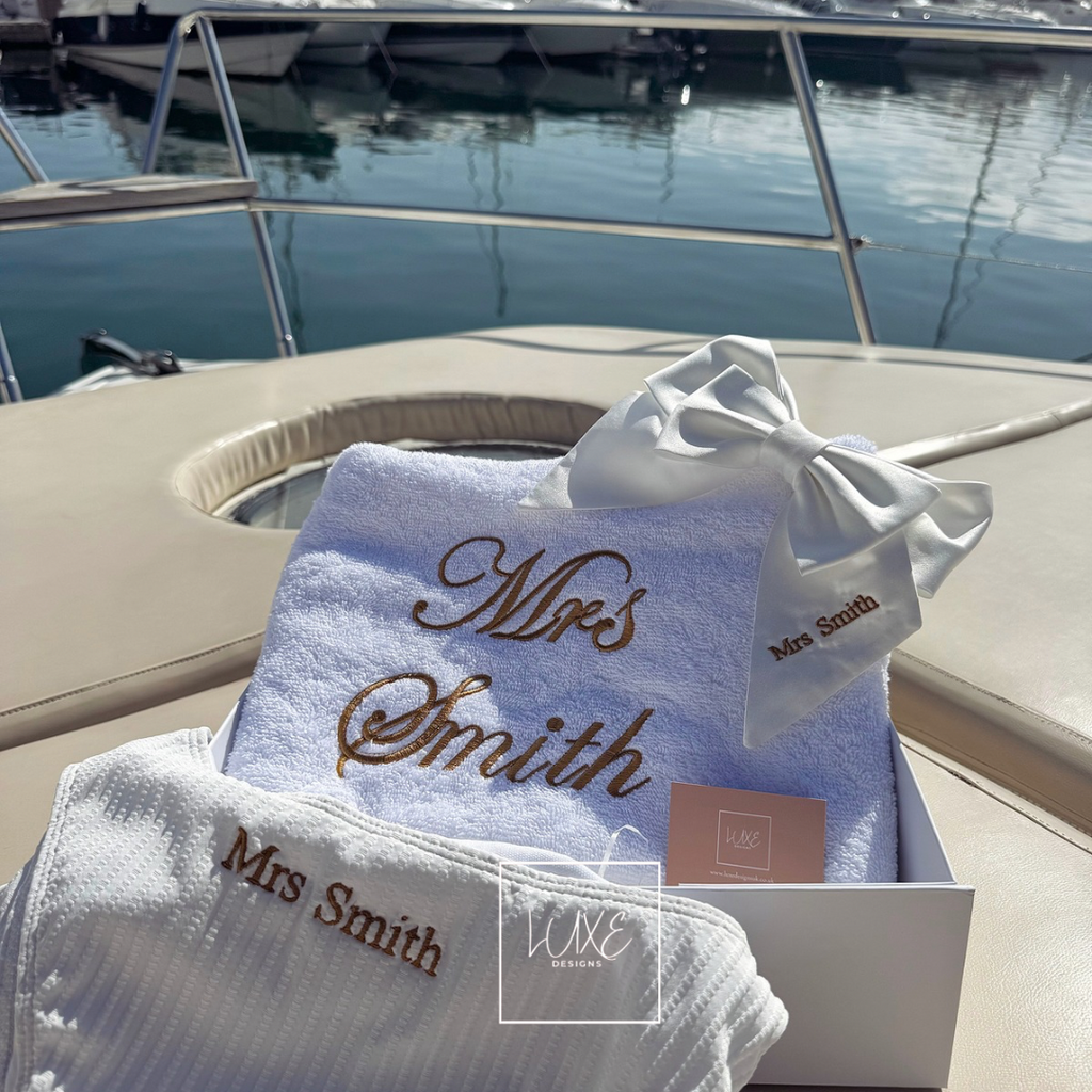 persomalised bride gift set on a boat deck