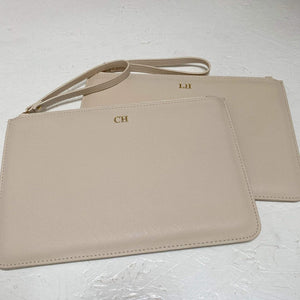 Personalised Pouch Accessory in beige. Image of two beige pouches.