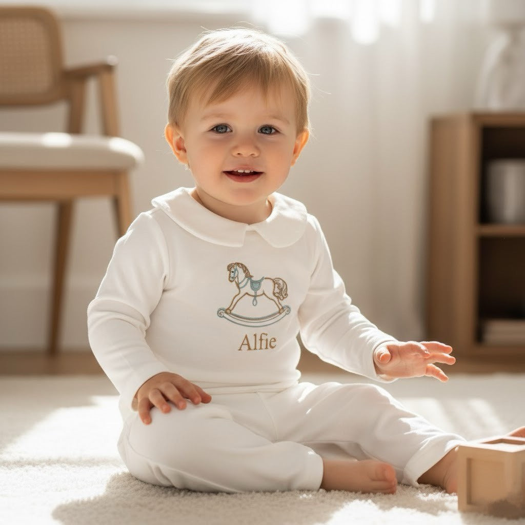 baby in personalised loungwear set with his name on it