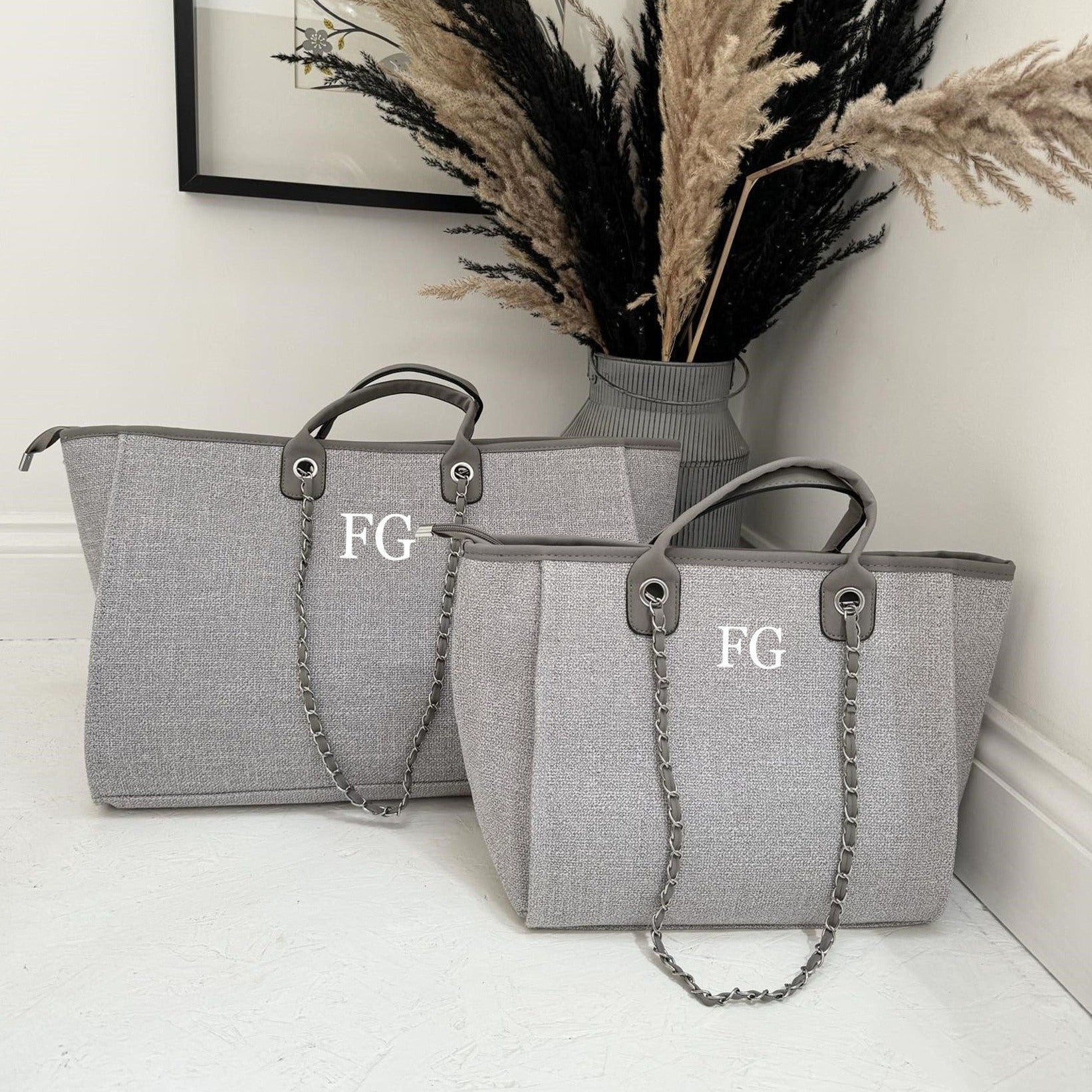 two grey personalised tote bags 