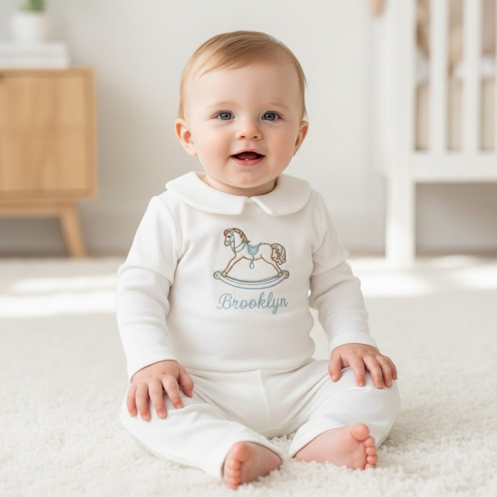 baby boy in his personalised lounge wear set with his name brooklyn on it 
