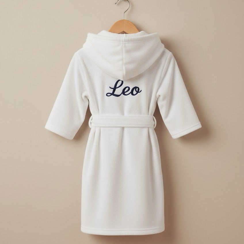 White robe with 'Leo' on a beige background
