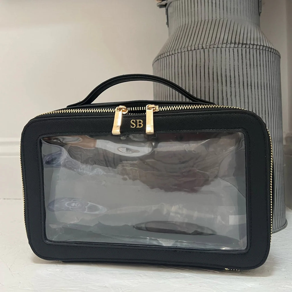 Black cosmetic bag with clear front panel and gold zipper personalised