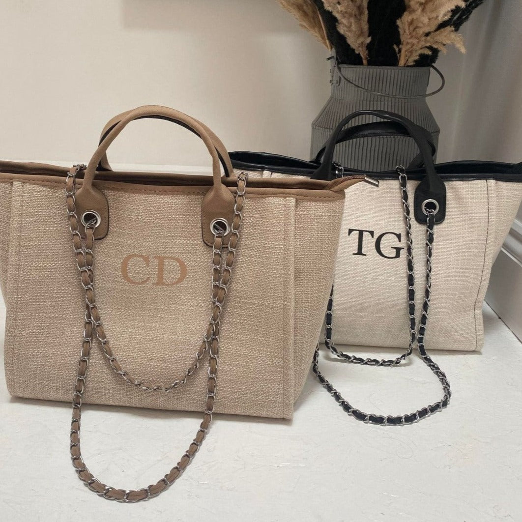 Two personalised beach tote bags one brown and one cream with black